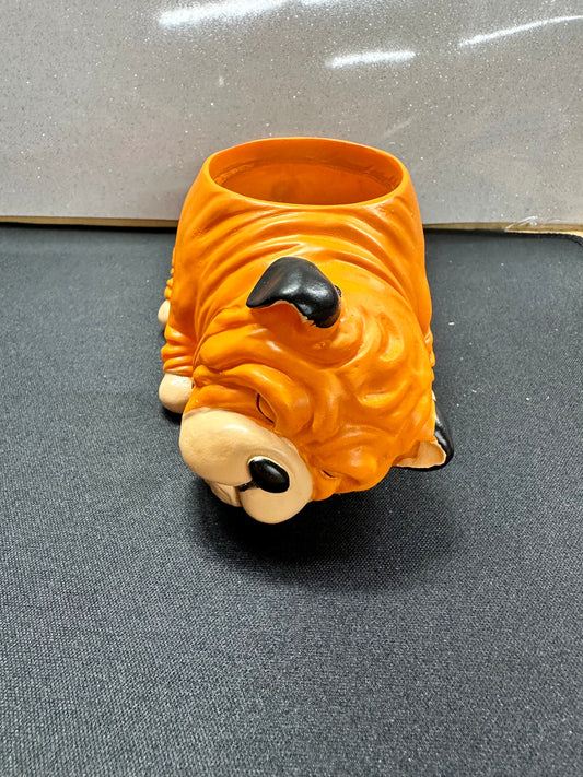 Conrad Corgie, Bud bulldog, Sally schnauzer, Peggy pug, and Henry husky planters