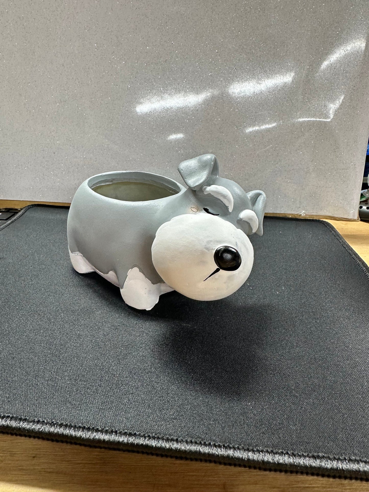 Conrad Corgie, Bud bulldog, Sally schnauzer, Peggy pug, and Henry husky planters