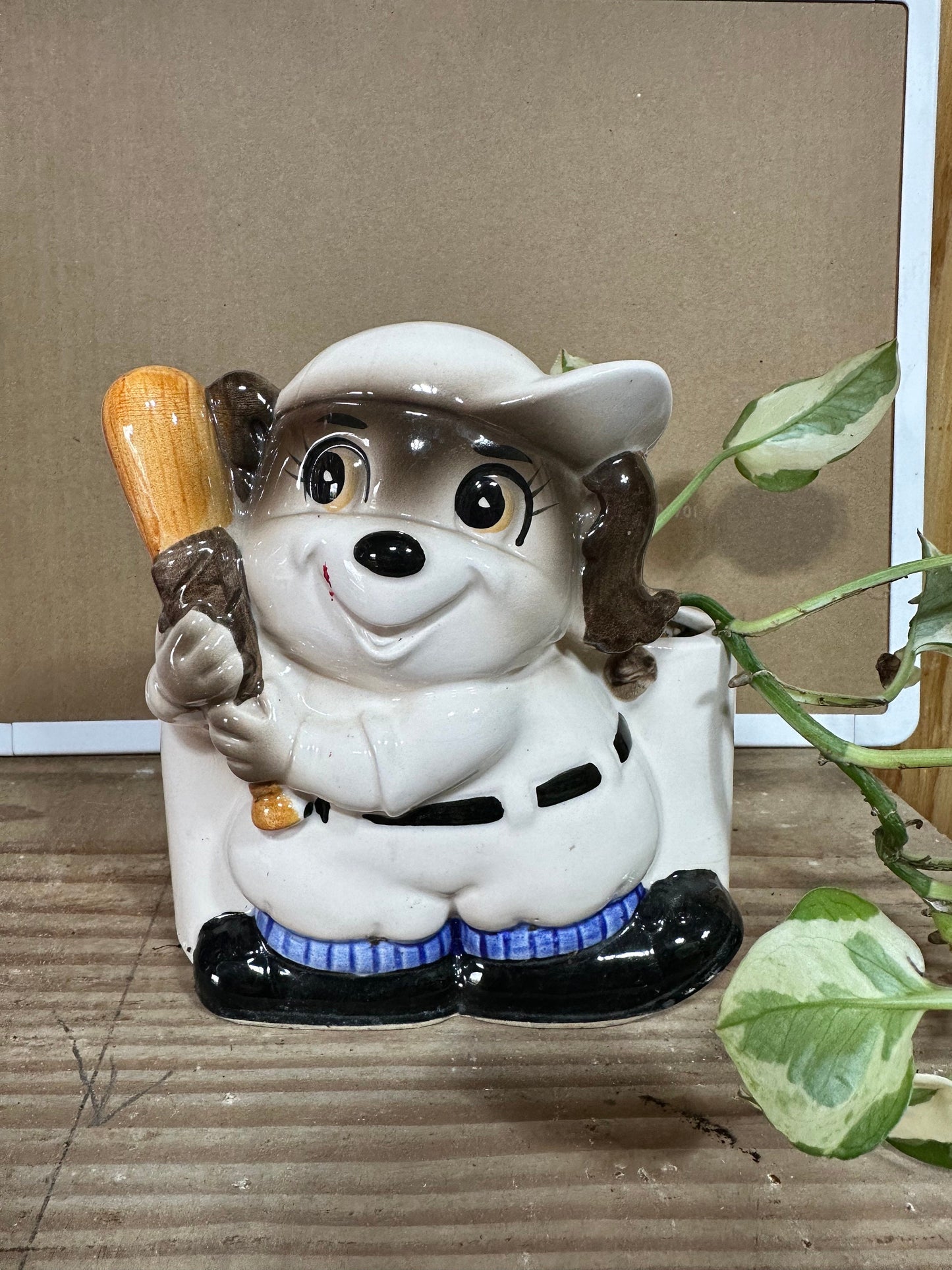 Vintage baseball dog planter